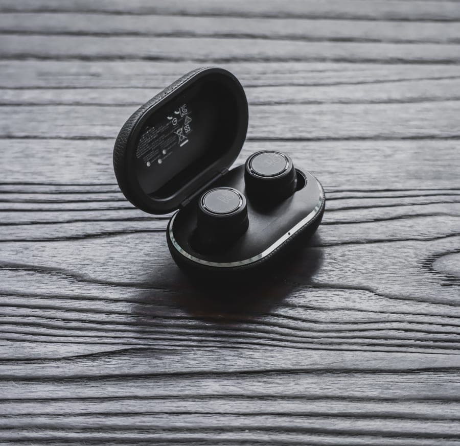 Budget true wireless earbuds in an open charging case